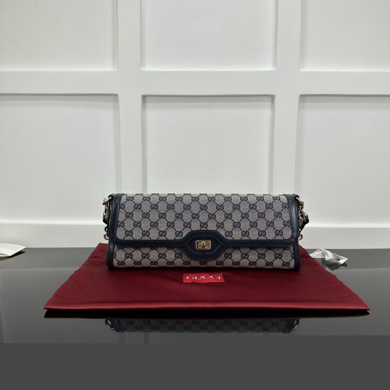 G*u*i satchel bags